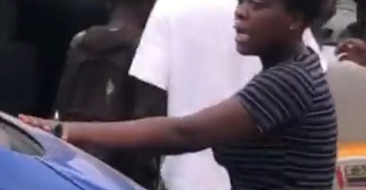Shocking Video–Lady Blocks Boyfriend From Moving His Vehicle From Trotro Station Because He Didn’t Give Her Enough Chop Money
