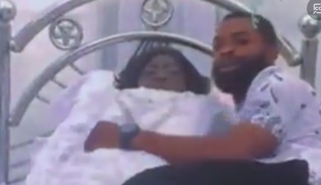 Man Caught ‘Sleeping’ With Dead Woman—Video Drops On Social Media (WATCH)