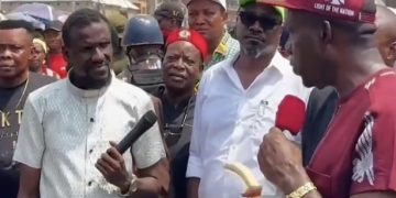 Nigerian Pastor Arrested For Preaching In The Middle Of A Noisy Market—Video